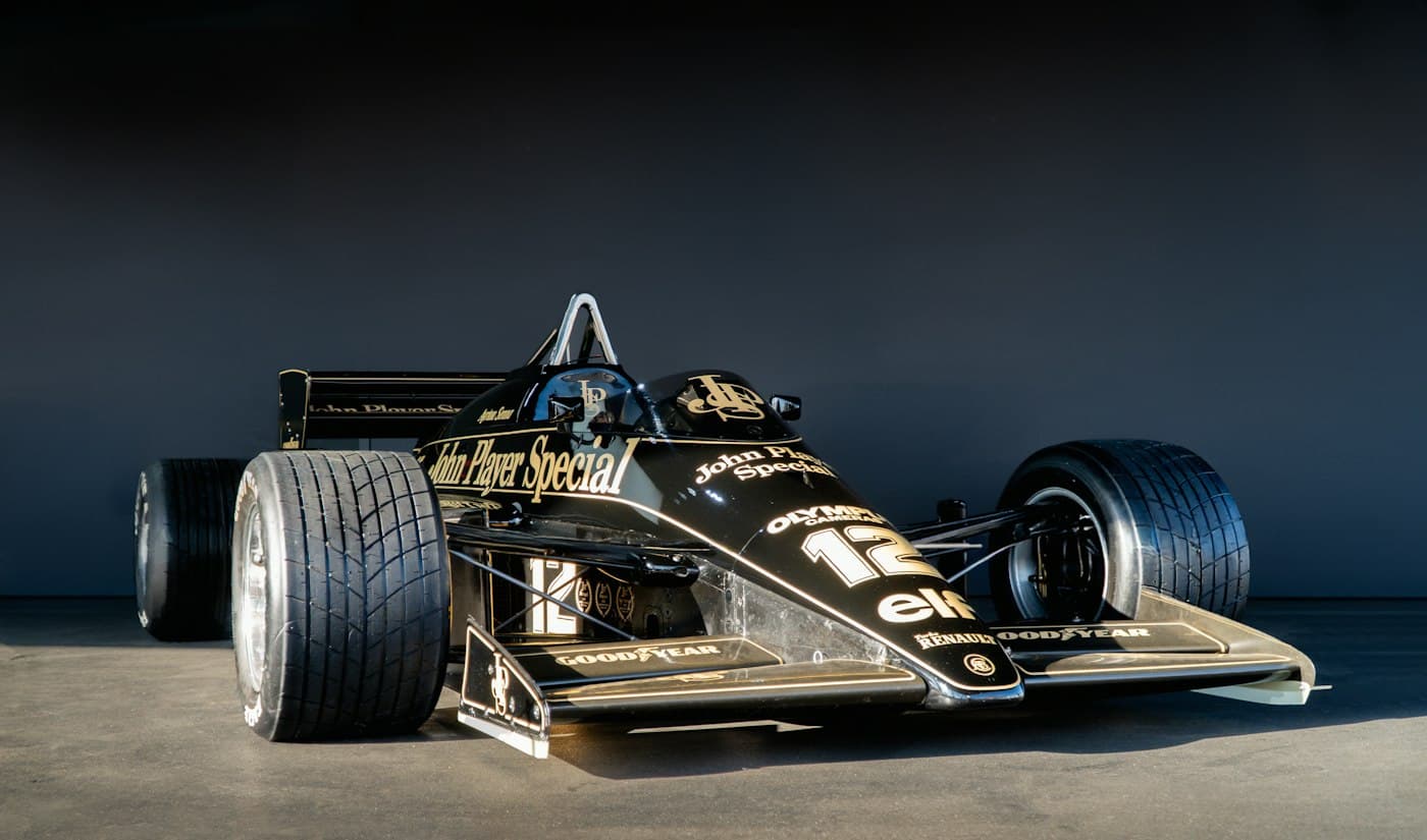 Black and gold 1980s Formula One car